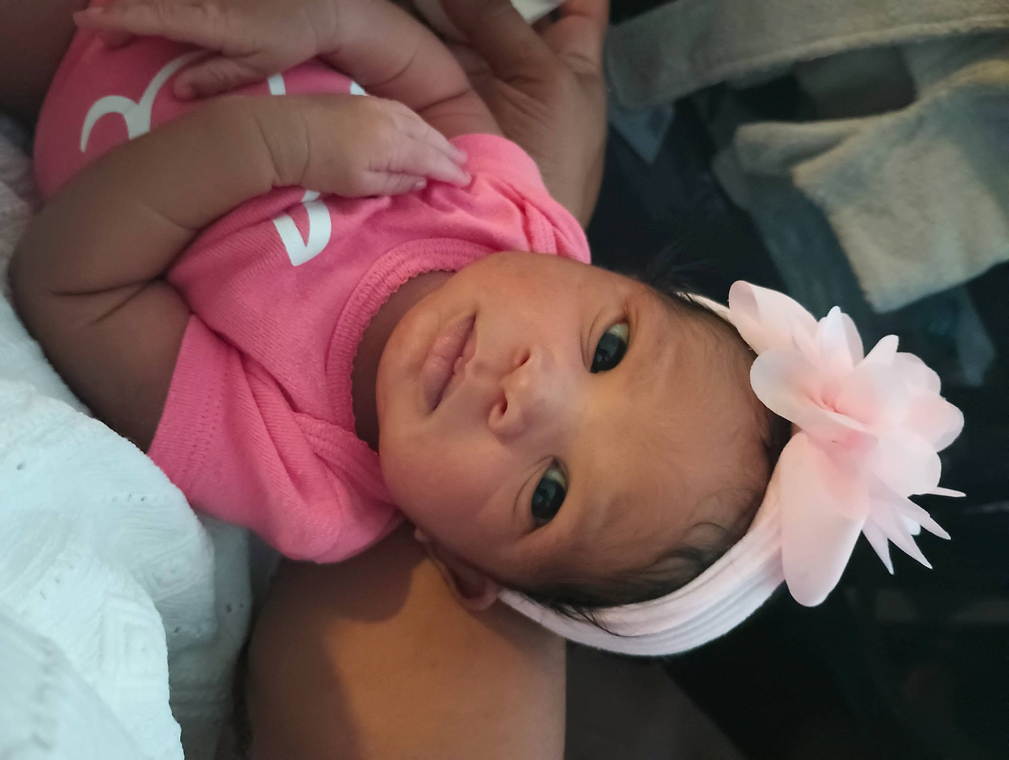 Damari joined the competition — help win amazing prizes! baby, baby_toddler_clothing, cheek, comfort, eyebrow, eyelash, face, finger, gesture, hand, headwear, human_body, iris, lip, mouth, neck, nose, person, pink, skin