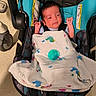 baby, baby_boy, blanket, car_seat, child, clothing, cute, floor, hands, head, indoor, infant, newborn, pacifier, person, resting, seat, stroller, toddler, young_child