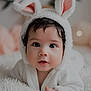 Angel joined the competition — help win amazing prizes! baby, bunny_costume, infant, cute, soft_texture, white_blanket, portrait, indoors, child, costume, wide_eyes, face, headwear, hands, soft_lighting, close_up, sleepwear, fluffy, adorable, cuteness