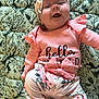 Abigail joined the competition — help win amazing prizes! baby, infant, smiling, headband, pink_clothing, floral_pattern, blanket, cute, happy, lying_down, child, portrait, indoors, soft_lighting, face, ribbon, toddler, playful, fashion, closeup