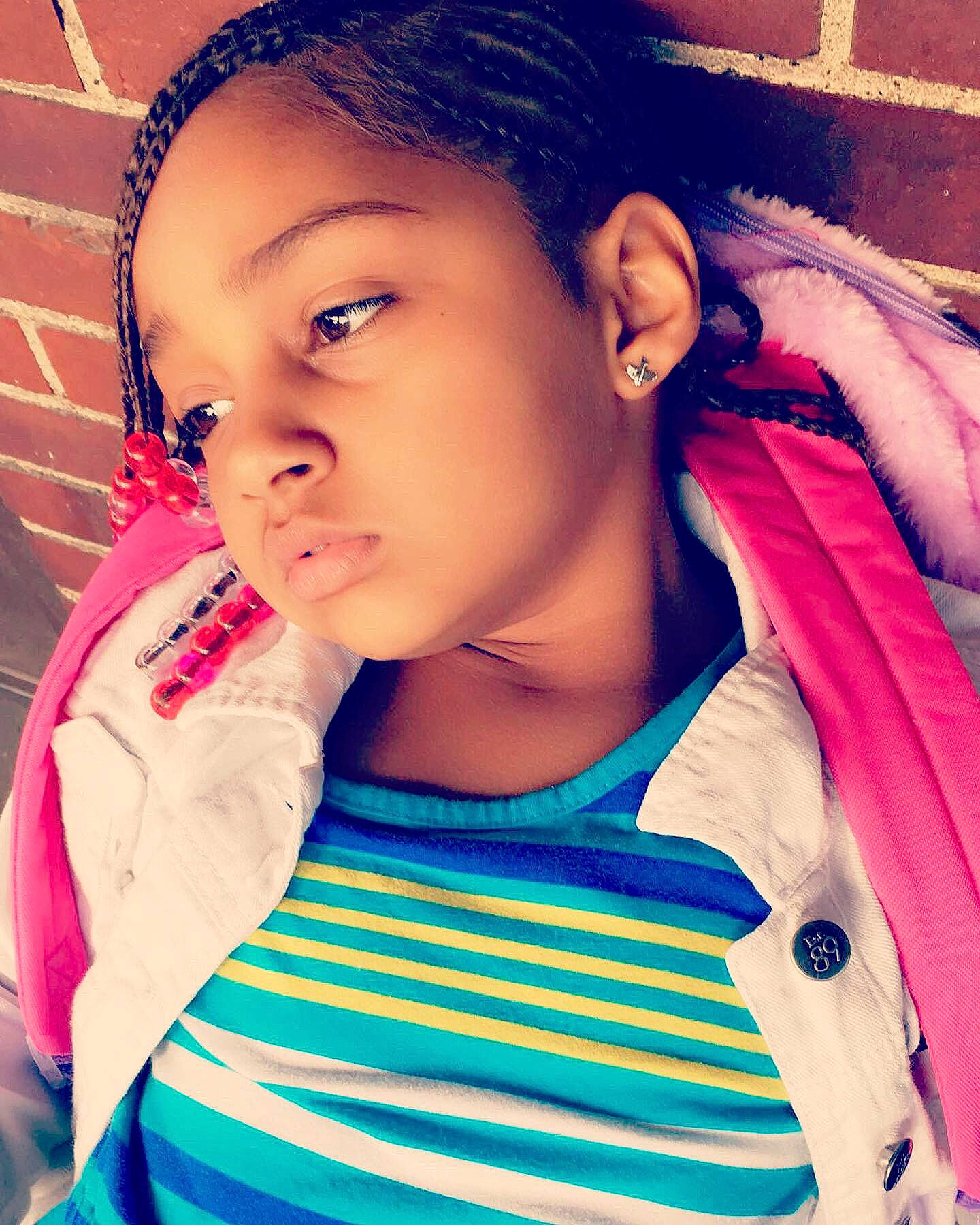 Anya is registered to the contest to win money with this photo: beauty, black_hair, cheek, child, cool, dreadlocks, eye, eyebrow, face, forehead, hair, hairstyle, head, lip, neck, nose, person, photography, pink, selfie