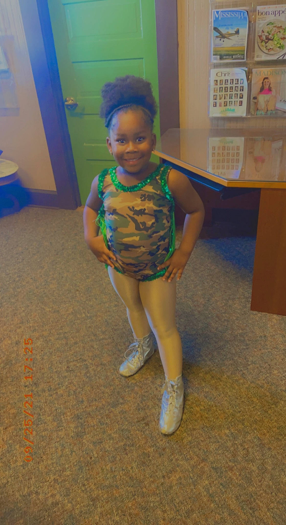 Pariss is registered to the contest to win money with this photo: blue, child, door, electric_blue, face, floor, flooring, foot, fun, happy, human_leg, joy, knee, leg, leisure, person, room, sandal, smile, thigh