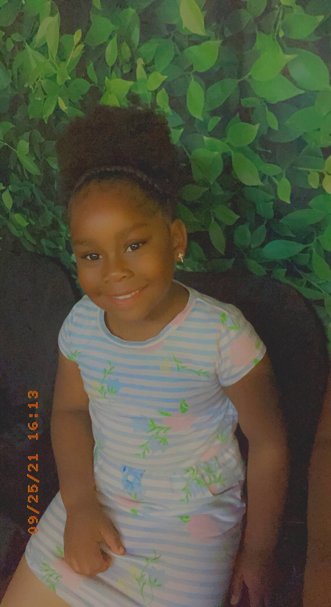 Pariss is registered to the contest to win money with this photo: baby_toddler_clothing, beauty, black_hair, cheek, chin, eyebrow, face, forehead, fun, grass, happy, iris, joy, neck, nose, organ, person, skin, sleeve, smile