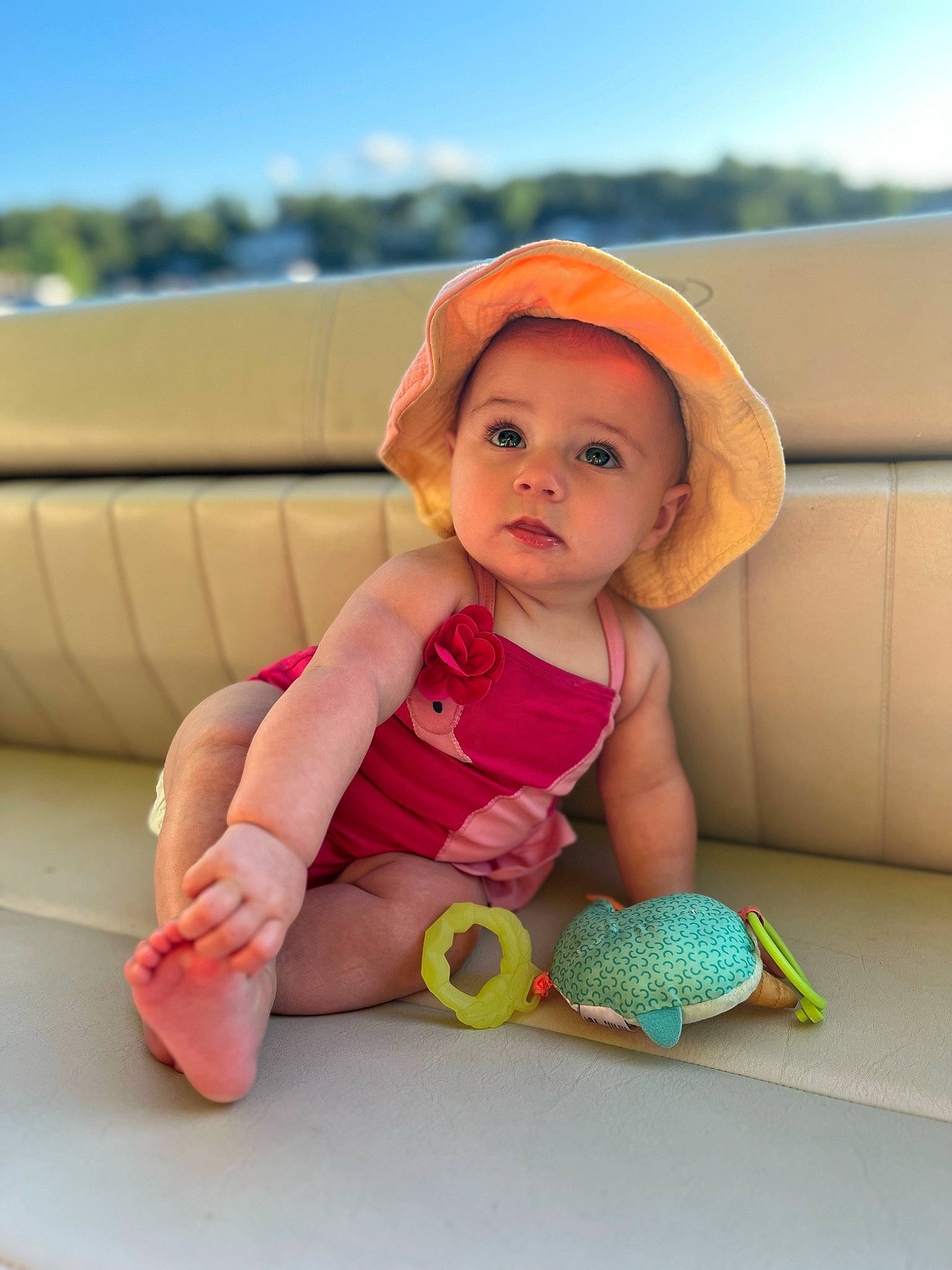 Demi joined the competition — help win amazing prizes! baby, baby_playing_with_toys, baby_toddler_clothing, cap, child, fun, grass, happy, hat, headgear, headwear, leisure, person, pink, sitting, skin, sky, sun_hat, thigh, toddler