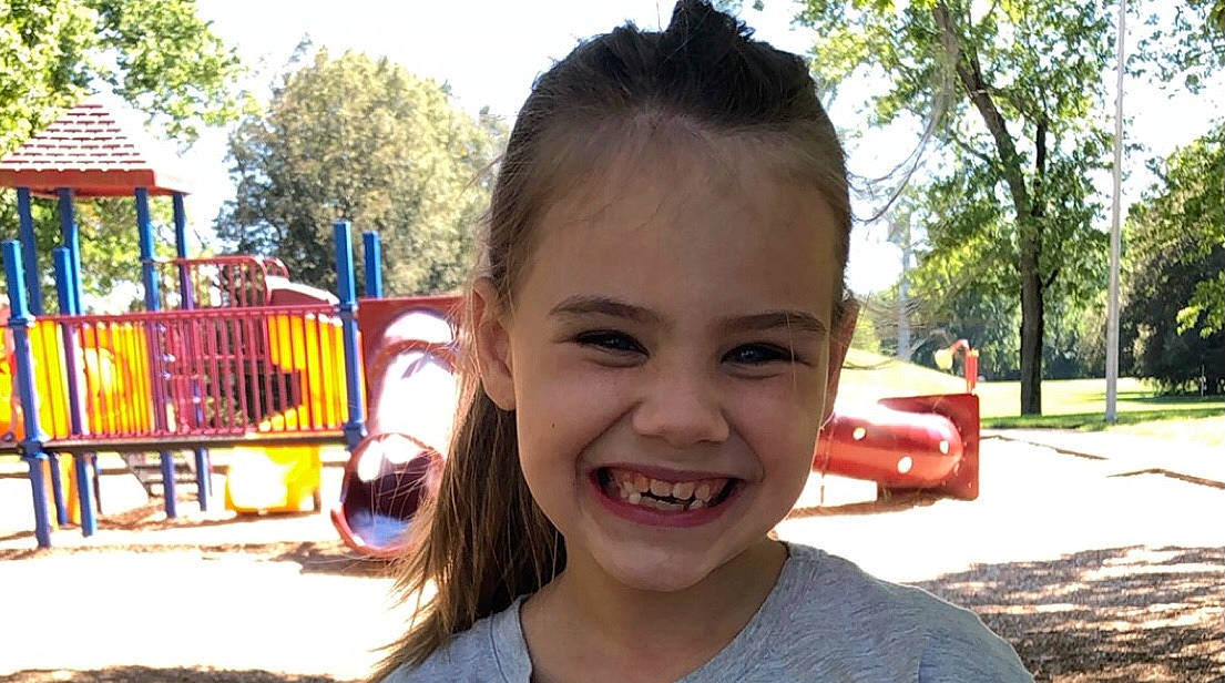 Lila is registered to the contest to win money with this photo: beauty, child, chute, city, fun, grass, happy, joy, leisure, lip, mouth, outdoor_play_equipment, person, plant, playground, recreation, sky, smile, t_shirt, toddler