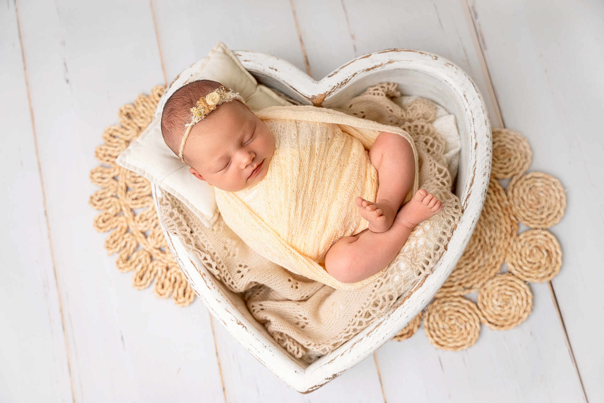 Hallie joined the competition — help win amazing prizes! newborn, baby, sleeping, wrapped, knit_blanket, heart_shaped_bowl, crocheted_mat, soft_texture, peaceful, infant, headband, pillow, wooden_floor, cozy, portrait, cute, resting, small_feet, delicate, studio_photography