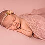baby, newborn, sleeping, pink, blanket, headband, flower, infant, soft, cute, peaceful, portrait, skin, resting, toddler, child, closeup, cozy, warm, delicate