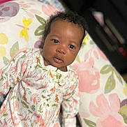 Leilani is registered to the contest to win money with this photo: baby, bed, bedroom, blanket, clothing, cushion, dress, face, furniture, happy, head, homedecor, indoors, newborn, person, photography, portrait, quilt, room, smile