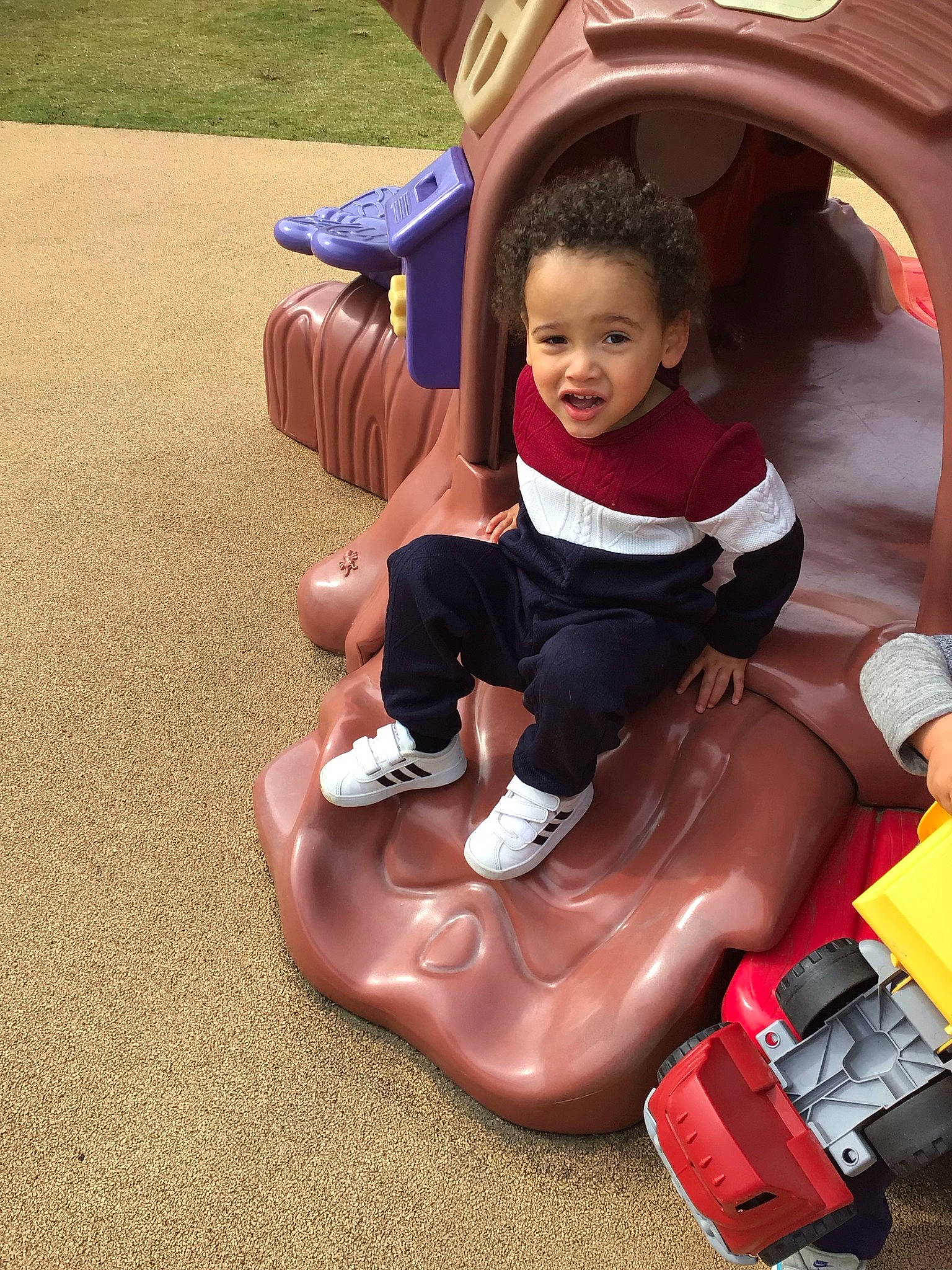 Julien joined the competition — help win amazing prizes! baby, baby_toddler_clothing, child, chute, city, comfort, fun, happy, human_body, lap, leg, leisure, outdoor_play_equipment, person, play, playground, recreation, sitting, smile, toddler