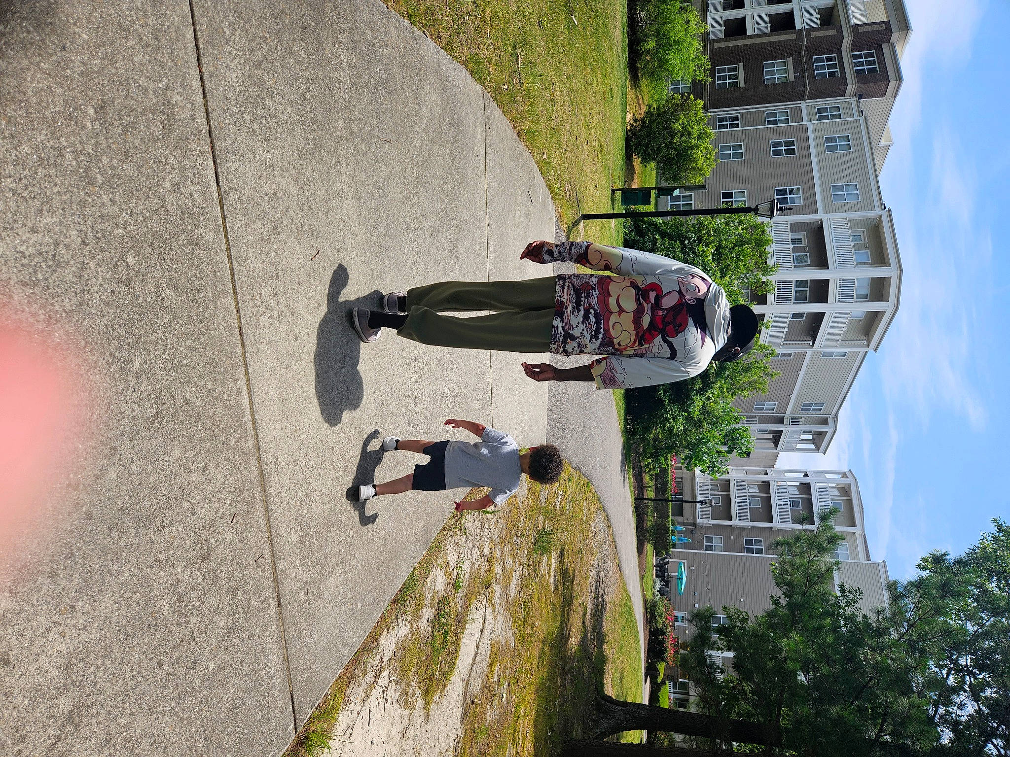 Julien is registered to the contest to win money with this photo: adventure, building, cloud, concrete, extreme_sport, facade, fun, house, leisure, person, plant, recreation, shadow, sky, tree, urban_design, walking_shoe, window, world