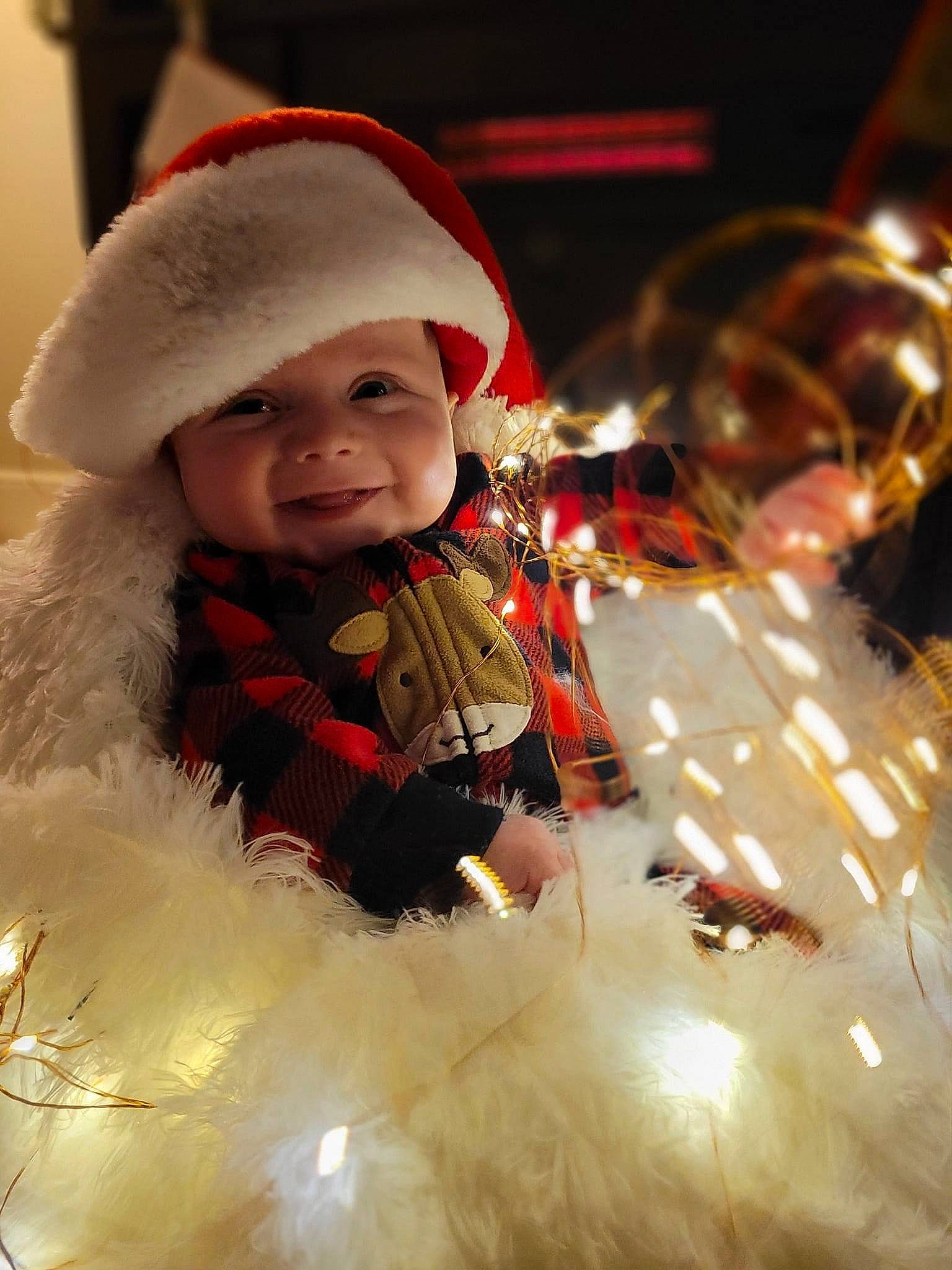 Jameson joined the competition — help win amazing prizes! baby, child, christmas, christmas_decoration, christmas_eve, christmas_lights, christmas_ornament, event, fictional_character, fun, fur, happy, headwear, holiday, holiday_ornament, ornament, outerwear, person, santa_claus, smile