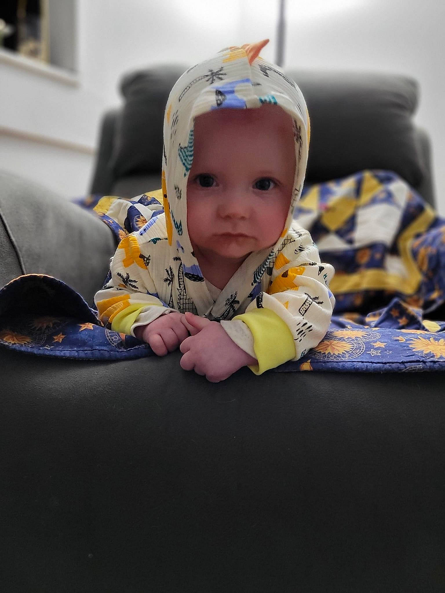 Jameson joined the competition — help win amazing prizes! baby, baby_toddler_clothing, cheek, child, comfort, couch, fashion_accessory, flash_photography, flooring, fun, grass, happy, headwear, person, personal_protective_equipment, portrait_photography, room, sitting, toddler, vacation