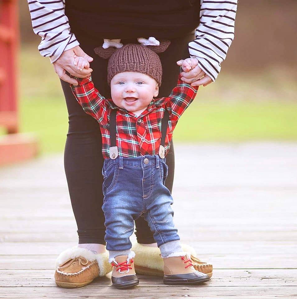 Jameson is registered to the contest to win money with this photo: baby, baby_toddler_clothing, beanie, cap, child, costume_hat, event, fun, gesture, grass, happy, headwear, pattern, person, play, portrait_photography, sleeve, smile, toddler, tree