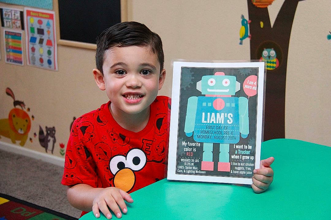 Liam is registered to the contest to win money with this photo: child, fictional_character, games, joy, learning, person, play, toddler