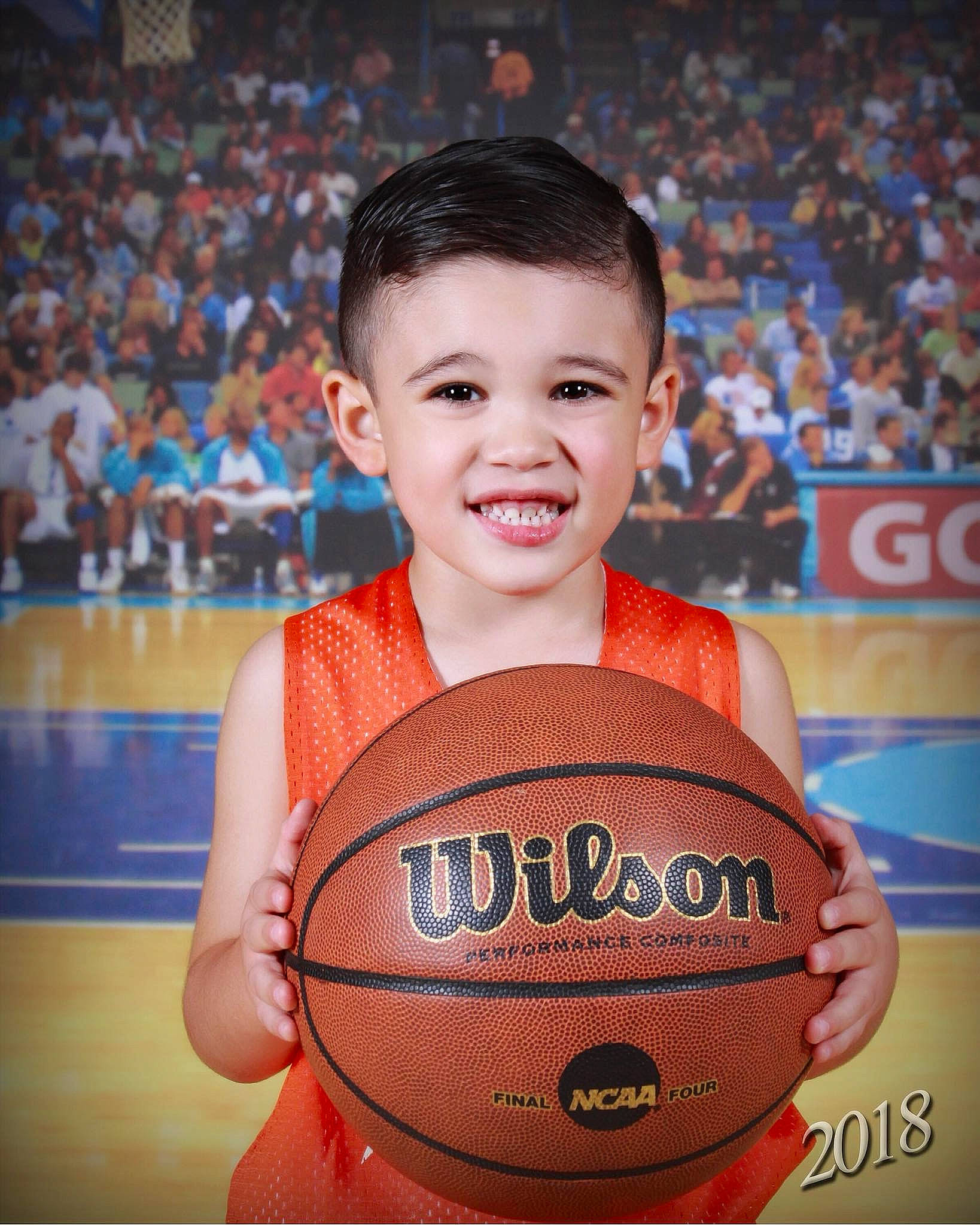 Liam is registered to the contest to win money with this photo: ball, ball_game, basketball, basketball_player, child, face, joy, person, player, sports, sports_equipment, team_sport