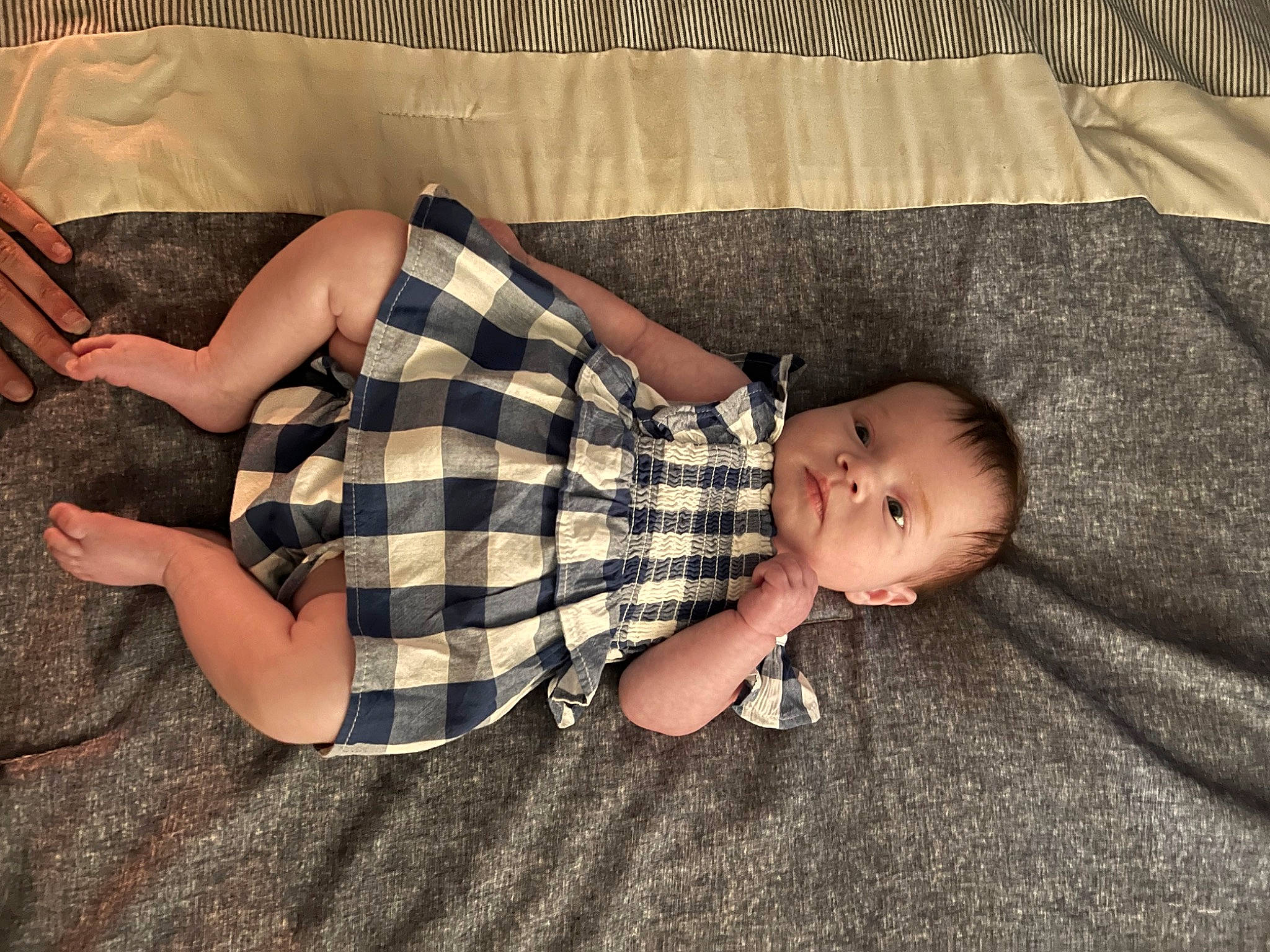 Izabella joined the competition — help win amazing prizes! baby, baby_toddler_clothing, beauty, child, comfort, finger, flooring, grass, human_leg, lap, mammal, pattern, person, plaid, sitting, skin, tartan, thigh, toddler, vertebrate