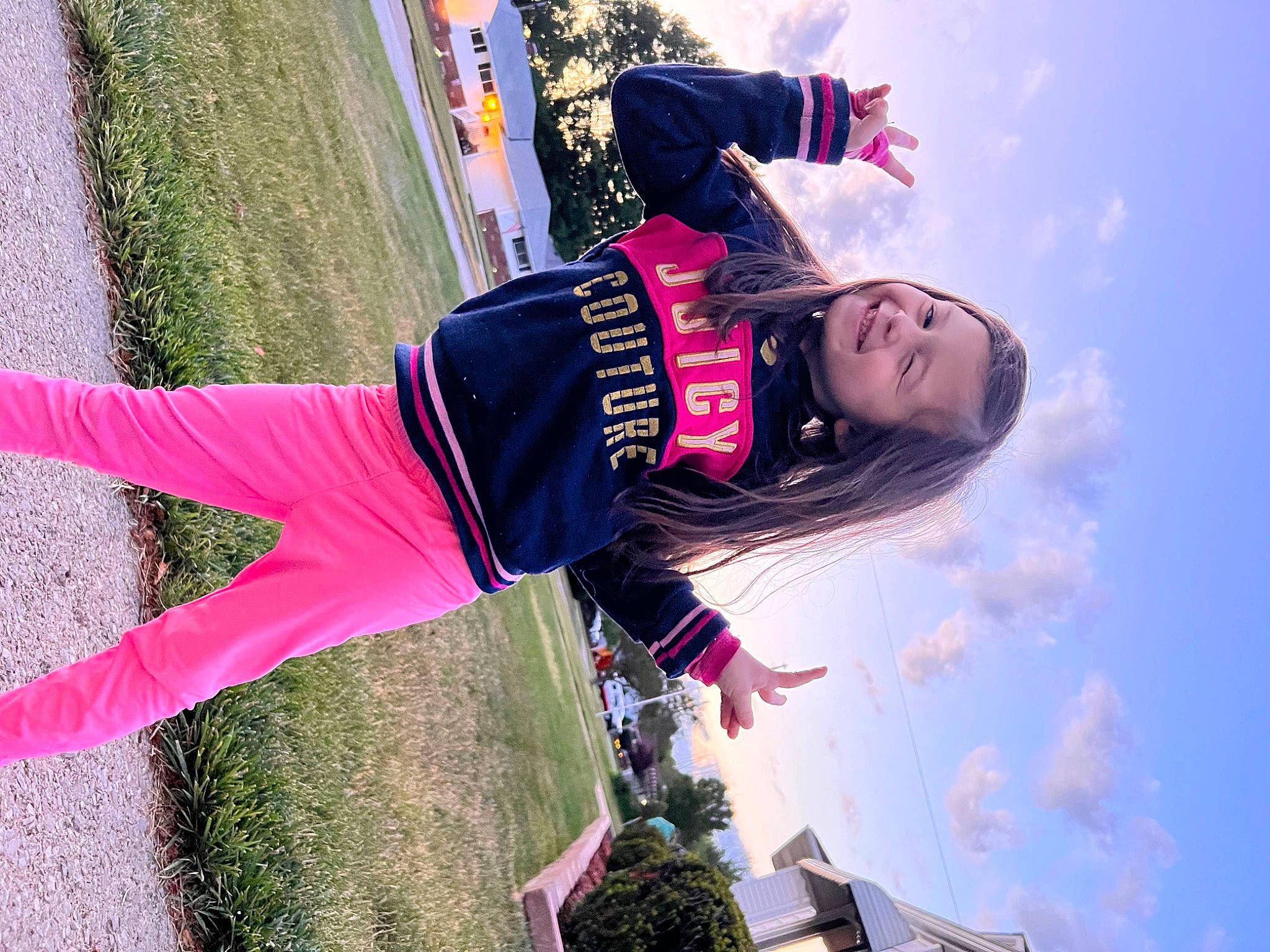 Madalye is registered to the contest to win money with this photo: adventure, beauty, cloud, electric_blue, fun, glove, grass, green, happy, joy, jumping, leisure, magenta, people_in_nature, person, pink, plant, recreation, sky, smile