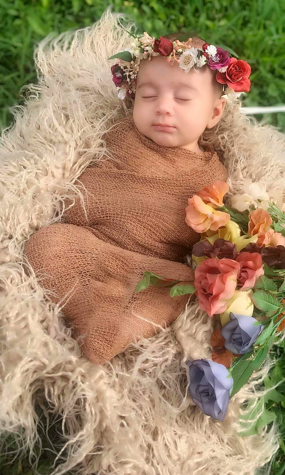 Ocean joined the competition — help win amazing prizes! baby, baby_toddler_clothing, brown_hair, child, dress, face, fawn, flower, grass, happy, headband, headgear, headpiece, headwear, jewellery, people_in_nature, person, petal, plant, rose