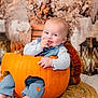 baby, pumpkin, smiling, autumn, fall_decor, lantern, dried_flowers, cute, indoor, child, orange, plush, seasonal, festive, cozy, portrait, sitting, happy, clothing, floor