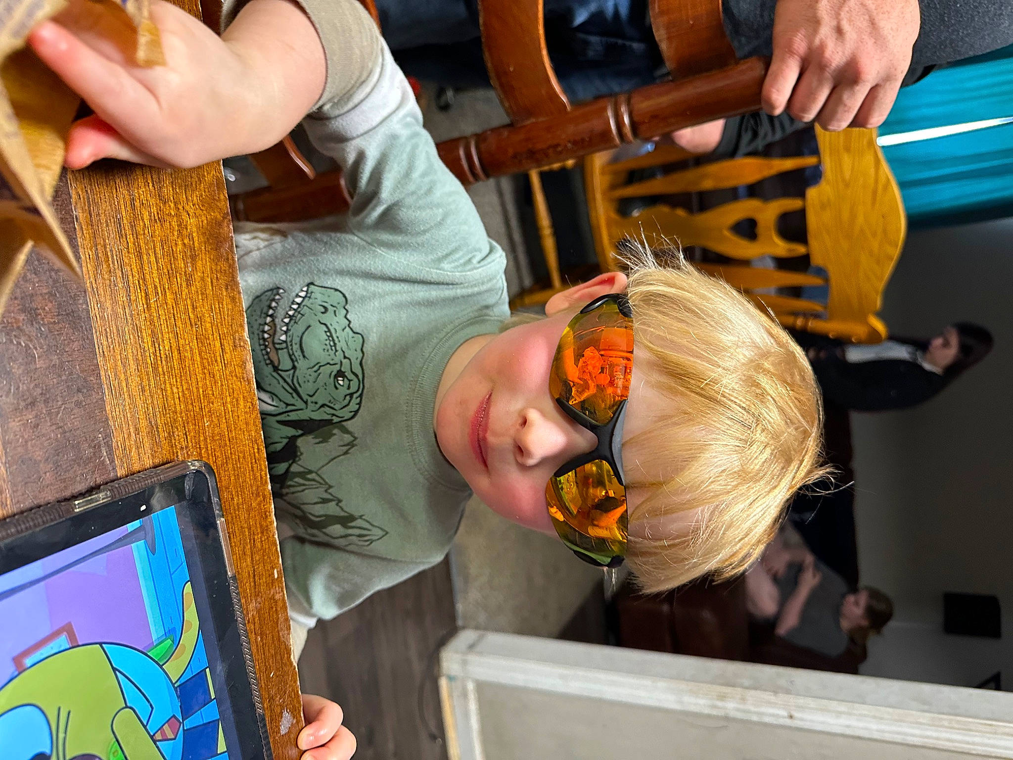 Aiden is registered to the contest to win money with this photo: arm, chair, child, community, engineering, fun, hand, hat, leisure, person, personal_protective_equipment, product, room, sitting, snapshot, t_shirt, toddler, under_exposed, visual_arts, wood