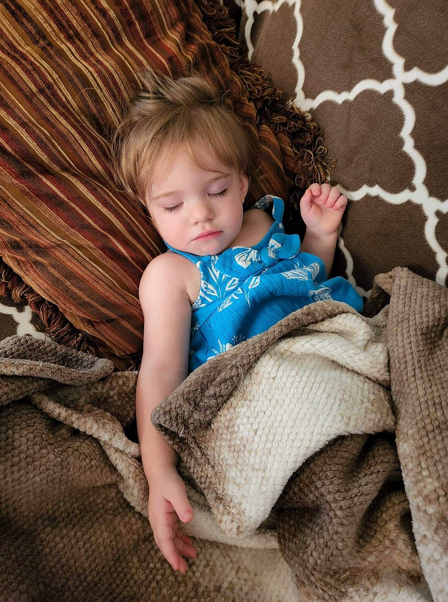 Ashton is registered to the contest to win money with this photo: brown_hair, child, comfort, eye, finger, flash_photography, flooring, foot, grass, hand, happy, human_leg, leg, linens, pattern, person, room, textile, thigh, toddler