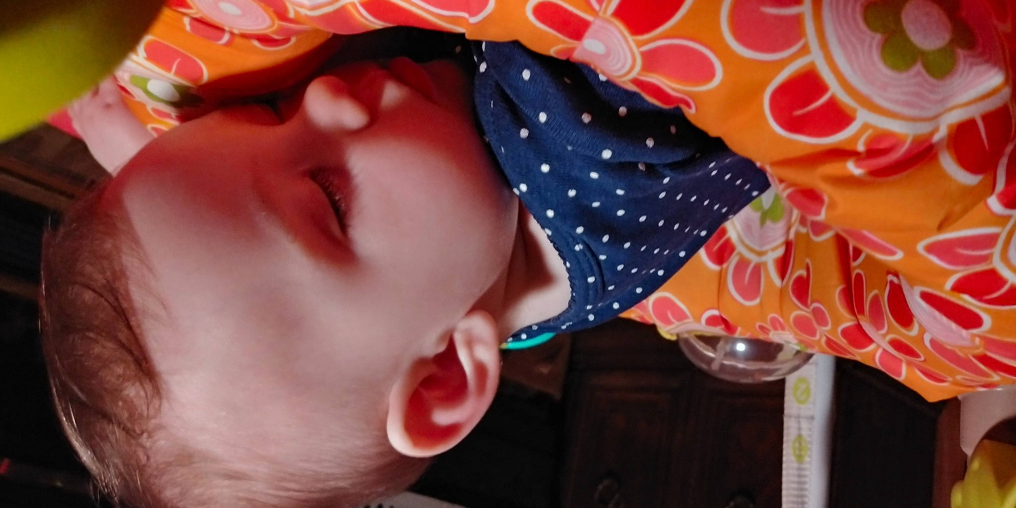 Ashton is registered to the contest to win money with this photo: baby, cap, cheek, chin, clothing, cool, eyebrow, eyelash, eyewear, facial_expression, finger, happy, headgear, lip, mouth, neck, nose, orange, person, pink