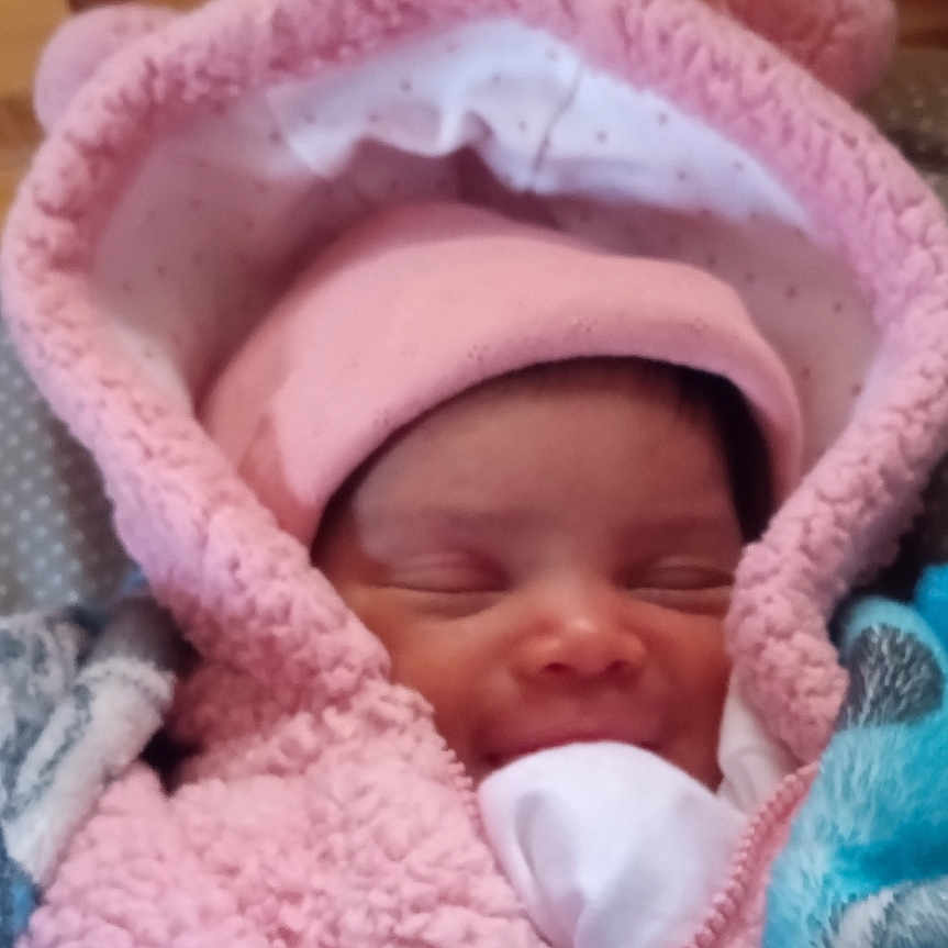 Serenity is registered to the contest to win money with this photo: baby, bed, blanket, bonnet, cap, clothing, crib, face, furniture, hat, head, hood, infantbed, newborn, person, photography, portrait, quilt, sleeping, towel