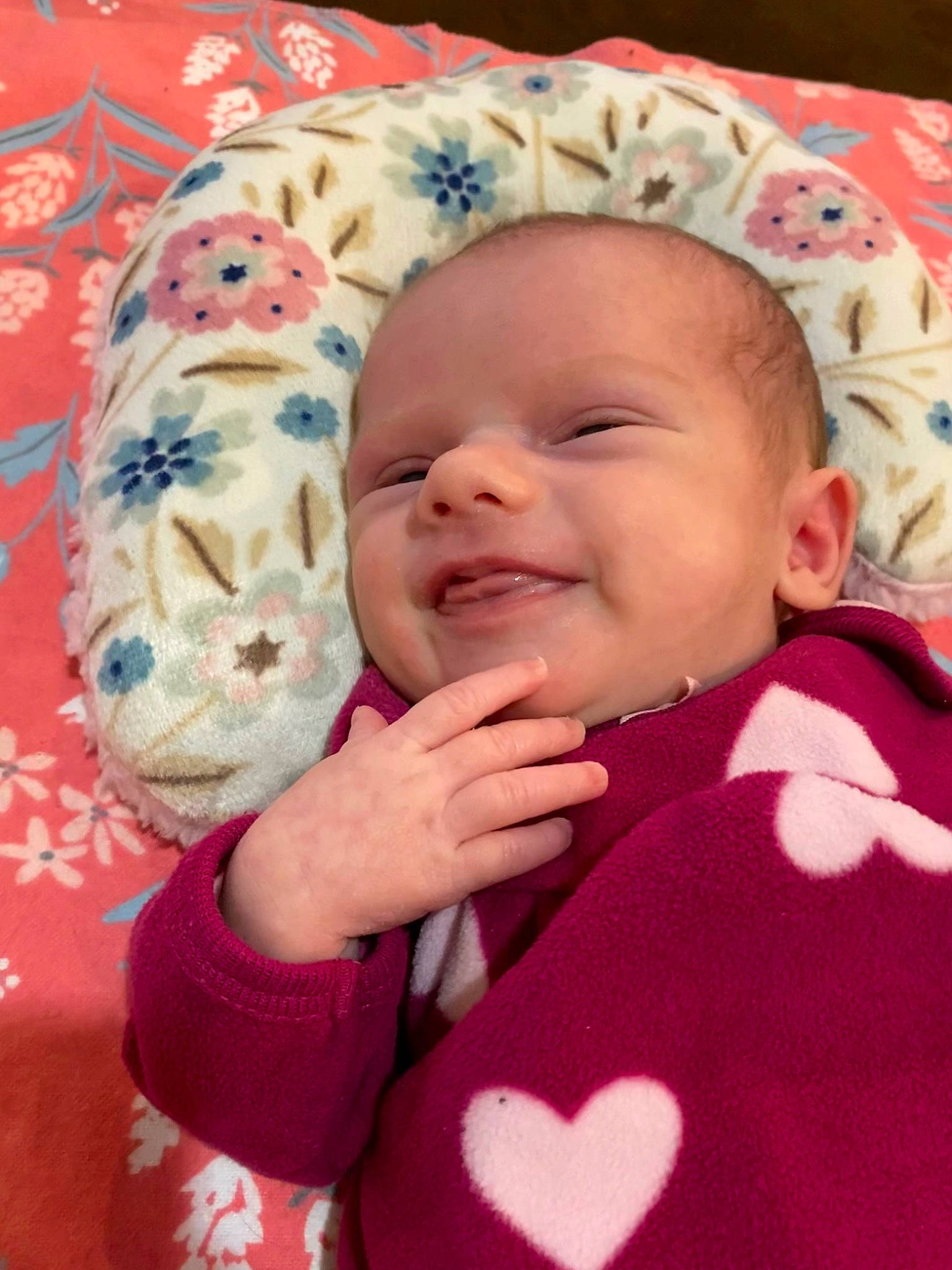 Jolene is registered to the contest to win money with this photo: baby, baby_toddler_clothing, cheek, chin, comfort, eye, face, gesture, happy, head, iris, lip, mouth, nose, person, pink, skin, sleeve, smile, textile