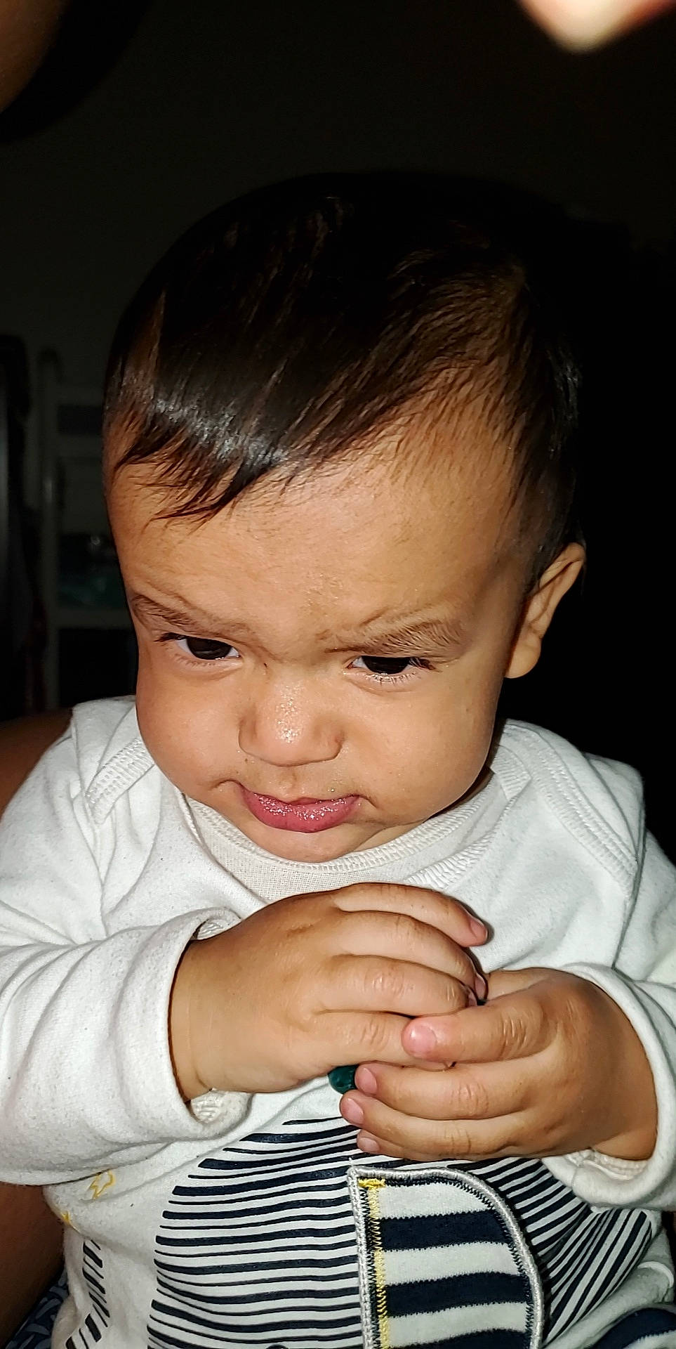 Kaleb is registered to the contest to win money with this photo: arm, baby, cheek, child, chin, eye, face, facial_expression, finger, forehead, hand, head, lip, male, mouth, muscle, nose, person, skin, smile