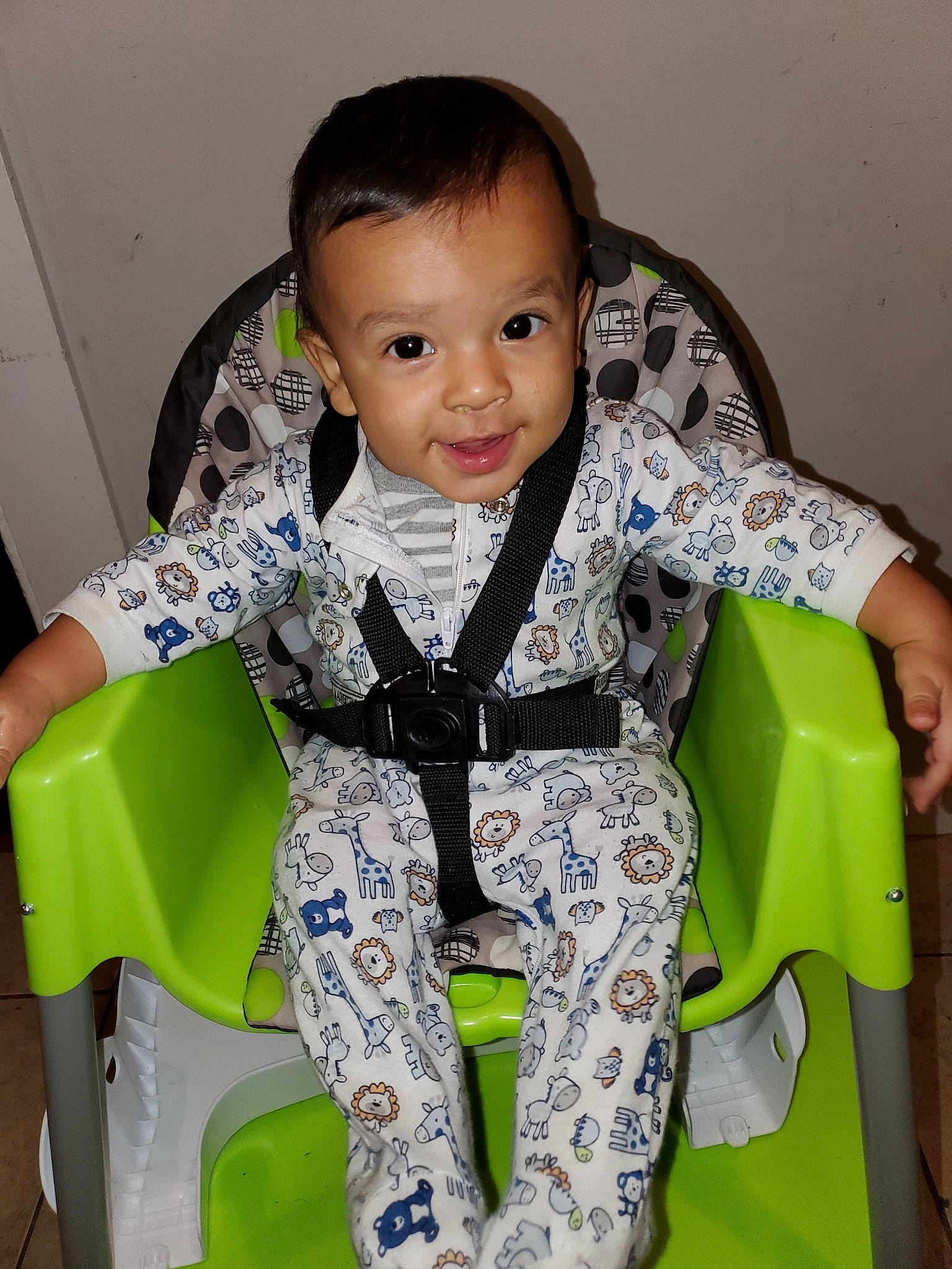 Kaleb is registered to the contest to win money with this photo: baby, baby_carriage, baby_products, baby_toddler_clothing, child, person, personal_protective_equipment, product, sitting, smile, toddler
