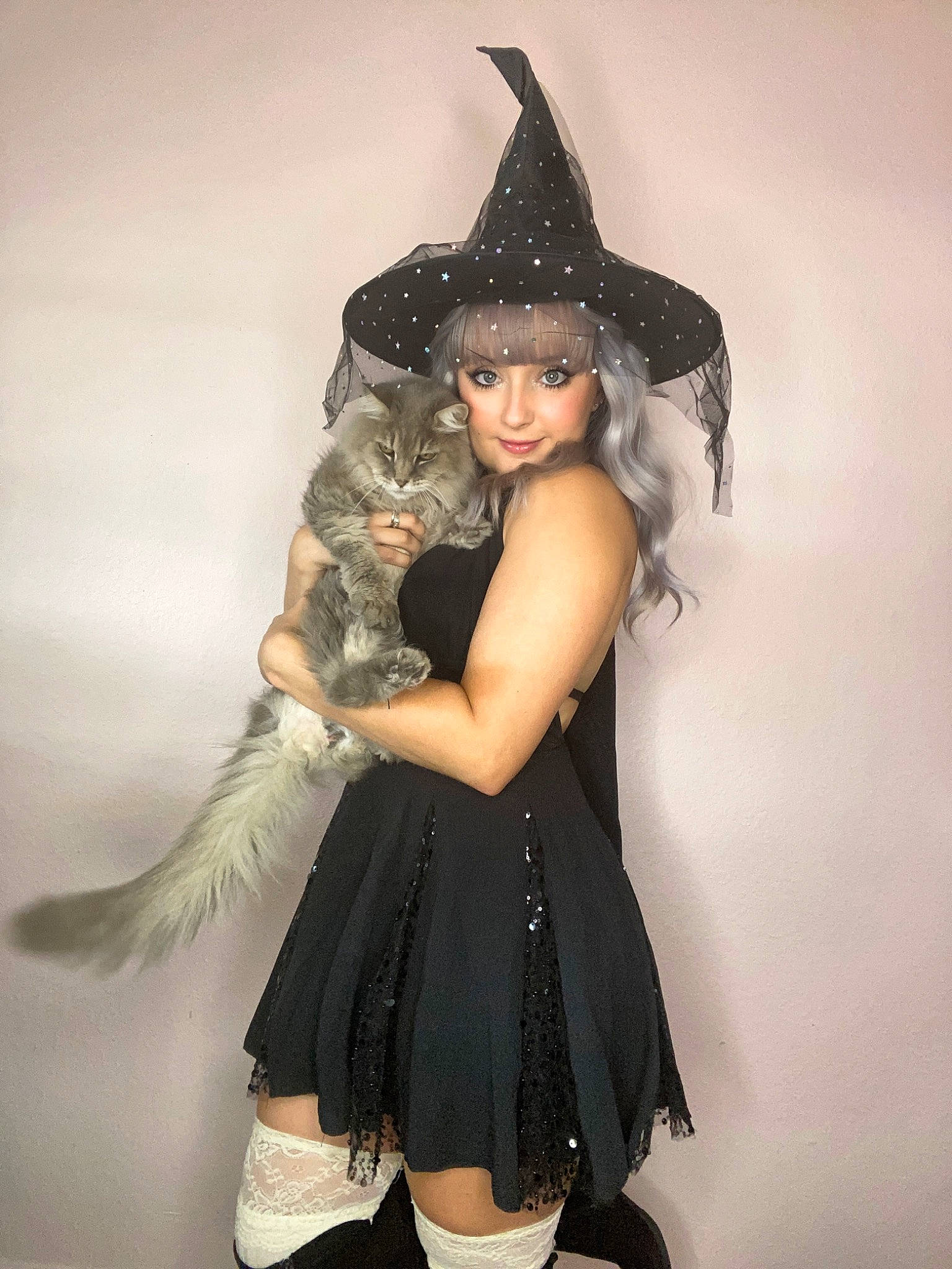 Fluffy joined the competition — help win amazing prizes! black_hair, costume_hat, dress, fashion, fashion_design, fedora, fictional_character, flash_photography, formal_wear, gesture, glove, hat, headgear, headpiece, jewellery, mythical_creature, sun_hat, thigh, waist, witch_hat