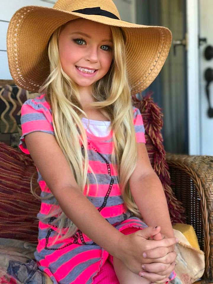 Caylee is registered to the contest to win money with this photo: beauty, clothing, cool, face, facial_expression, fashion, fashion_design, fun, happy, hat, head, headwear, joy, lip, long_hair, neck, person, skin, smile, street_fashion