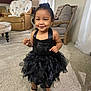 Zana is registered to the contest to win money with this photo: architecture, building, child, clothing, costume, couch, dress, face, footwear, formalwear, furniture, head, indoors, livingroom, person, photography, portrait, room, shoe, skirt