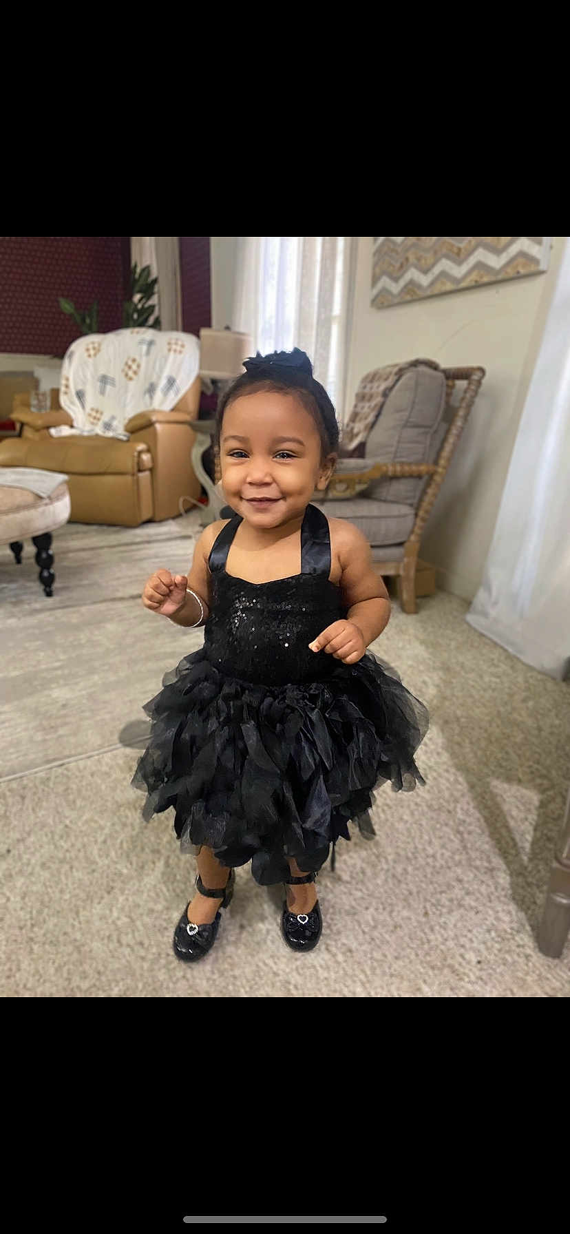 Zana is registered to the contest to win money with this photo: architecture, building, child, clothing, costume, couch, dress, face, footwear, formalwear, furniture, head, indoors, livingroom, person, photography, portrait, room, shoe, skirt