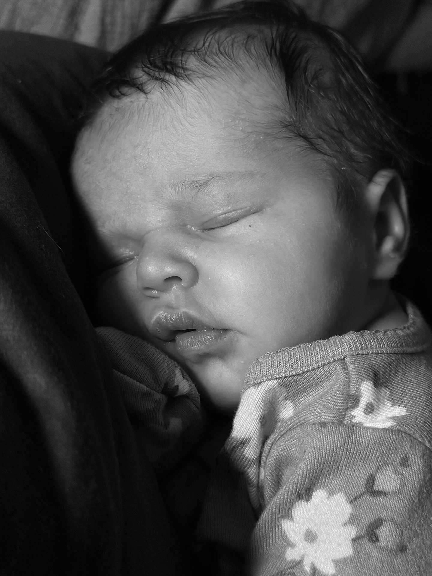 Oakley joined the competition — help win amazing prizes! baby, sleeping, infant, black_and_white, close_up, face, soft_lighting, peaceful, cozy, child, portrait, newborn, clothing, pattern, floral, cute, resting, head, skin, young