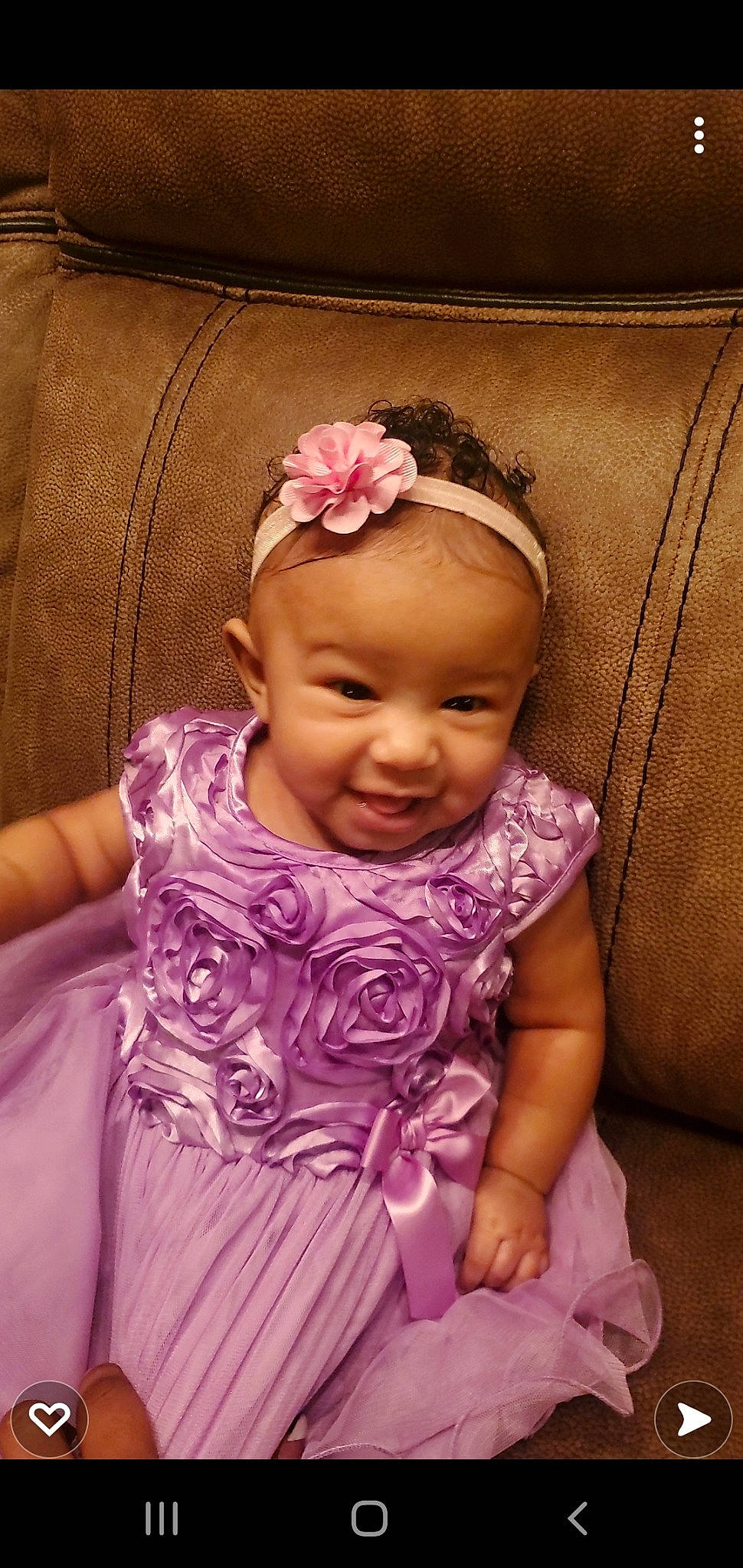 Iyarah is registered to the contest to win money with this photo: arm, baby_toddler_clothing, cheek, dress, eye, eyebrow, eyelash, face, hair, happy, head, iris, lip, neck, person, pink, purple, skin, sleeve, smile