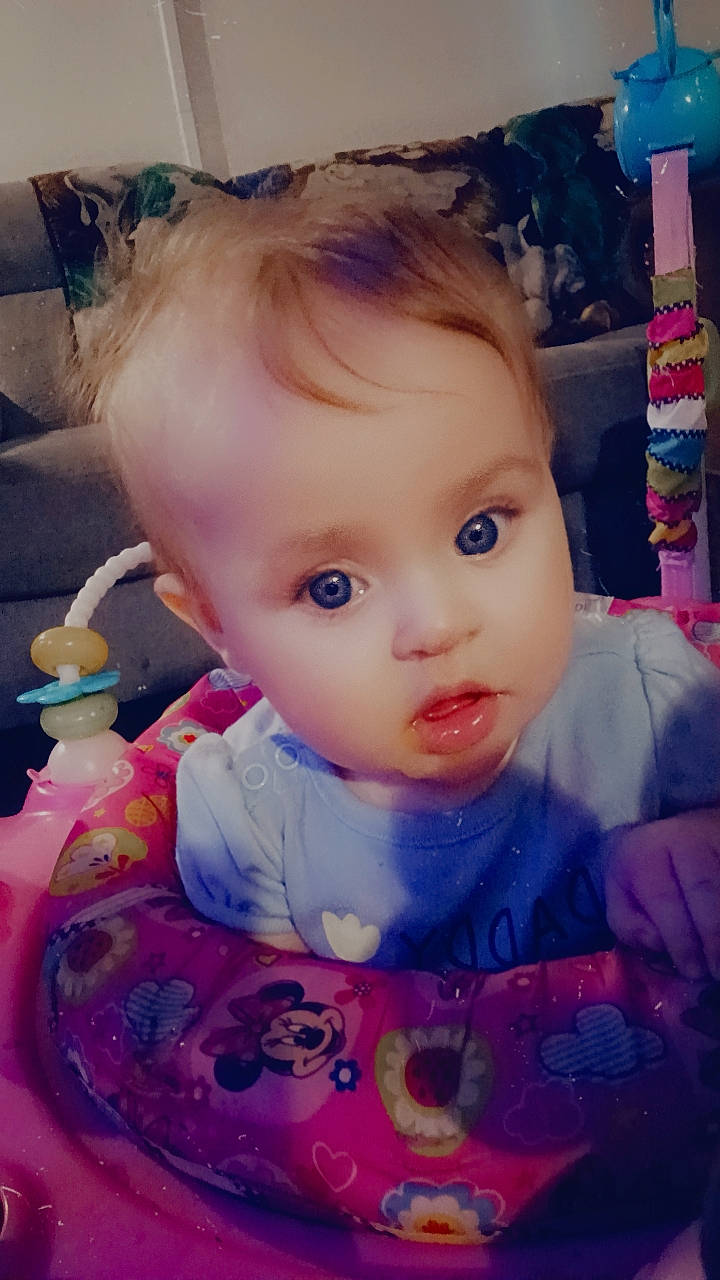 Isabella is registered to the contest to win money with this photo: baby, baby_toddler_clothing, cheek, child, chin, cool, dress, ear, eyebrow, eyelash, happy, head, human_body, iris, lip, mouth, nose, person, pink, skin