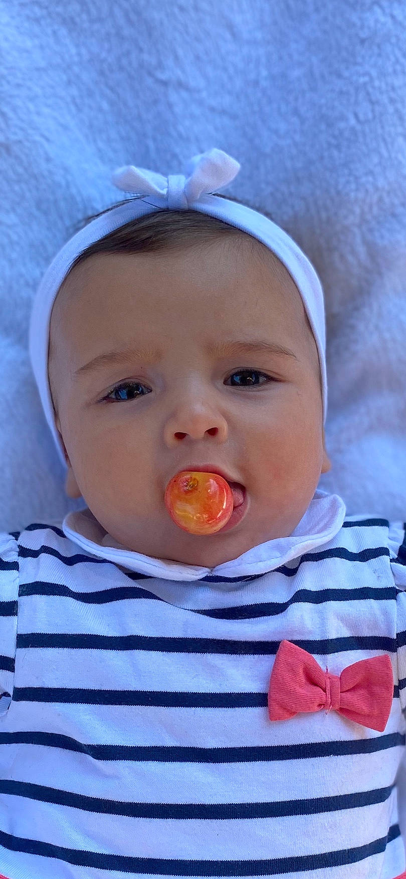 Romy a rejoint le concours — aidez-le/la à gagner de superbes lots ! baby, baby_toddler_clothing, cheek, child, chin, close_up, eye, fun, happy, hat, iris, lip, mammal, mouth, nose, person, skin, sleeve, smile, toddler