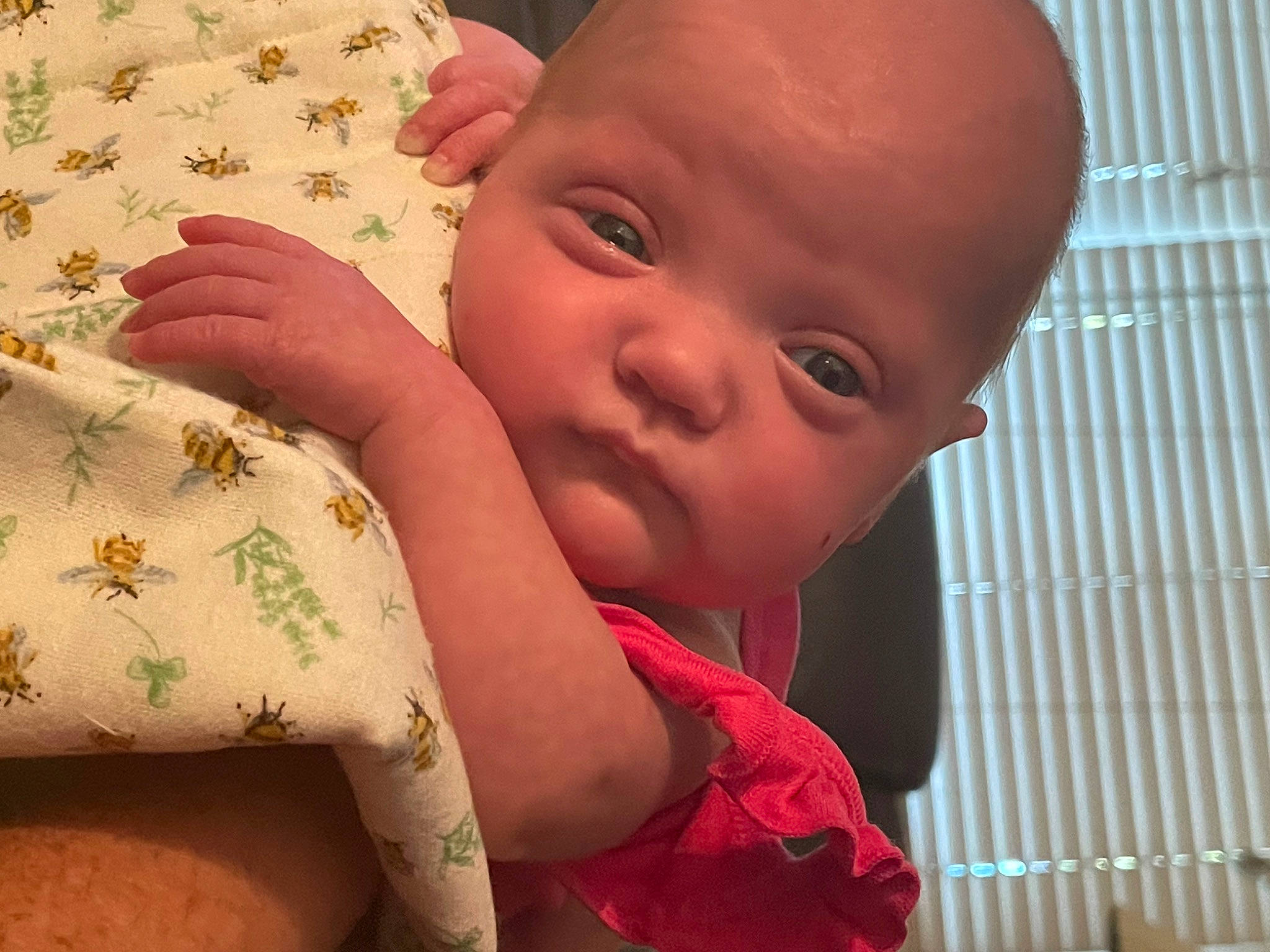 Olivia is registered to the contest to win money with this photo: baby, baby_toddler_clothing, cheek, child, comfort, finger, grass, happy, human_leg, linens, lip, nail, nose, pattern, person, skin, sleeve, smile, thumb, toddler