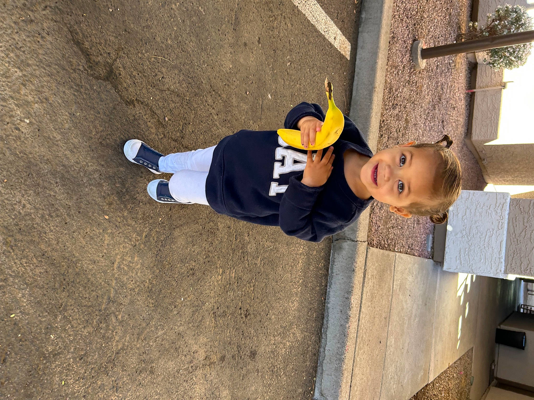 Vada is registered to the contest to win money with this photo: asphalt, child, concrete, fun, hat, joy, person, shadow, soil, toddler, walking_shoe