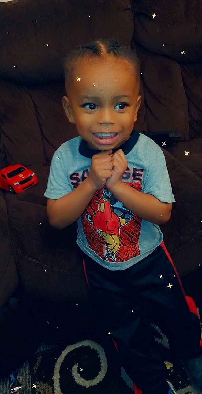 Camren is registered to the contest to win money with this photo: arm, baby, baby_toddler_clothing, bicycle_helmet, button, cheek, child, cool, eye, facial_expression, finger, hand, happy, joy, laugh, person, pleased, sleeve, thumb, toddler