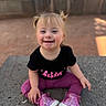 Jean Grey joined the competition — help win amazing prizes! black_shirt, casual_clothing, child, concrete, cute, daylight, face, happy, outdoor, person, pigtails, playful, portrait, purple_pants, purple_shoes, shoe, sitting, smile, toddler, young_child