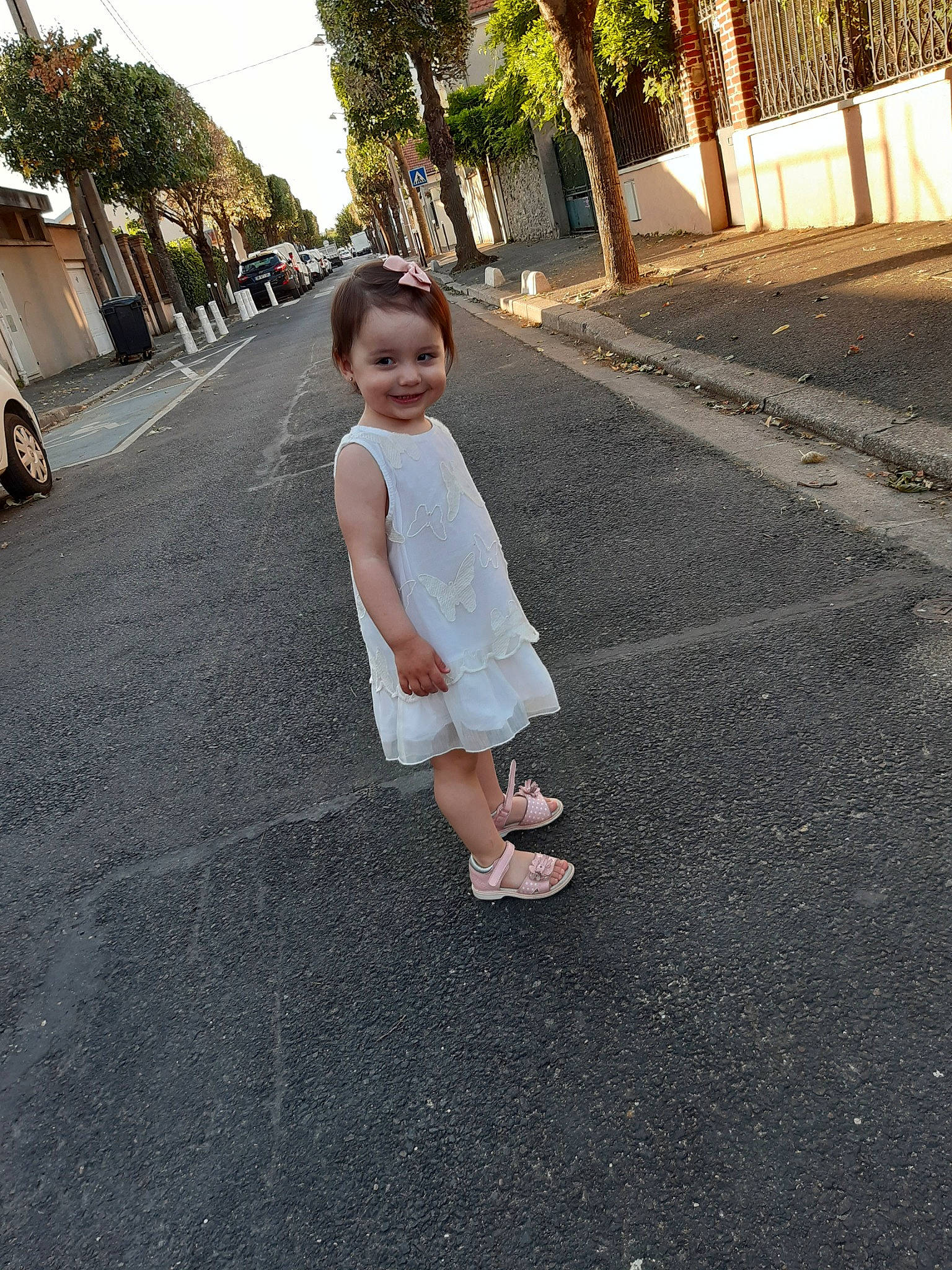 Yasmina participe au concours pour gagner de l'argent avec cette photo : asphalt, beauty, child, dress, footwear, joy, leg, person, photograph, photography, road, road_surface, shoe, sidewalk, smile, snapshot, standing, textile, vacation