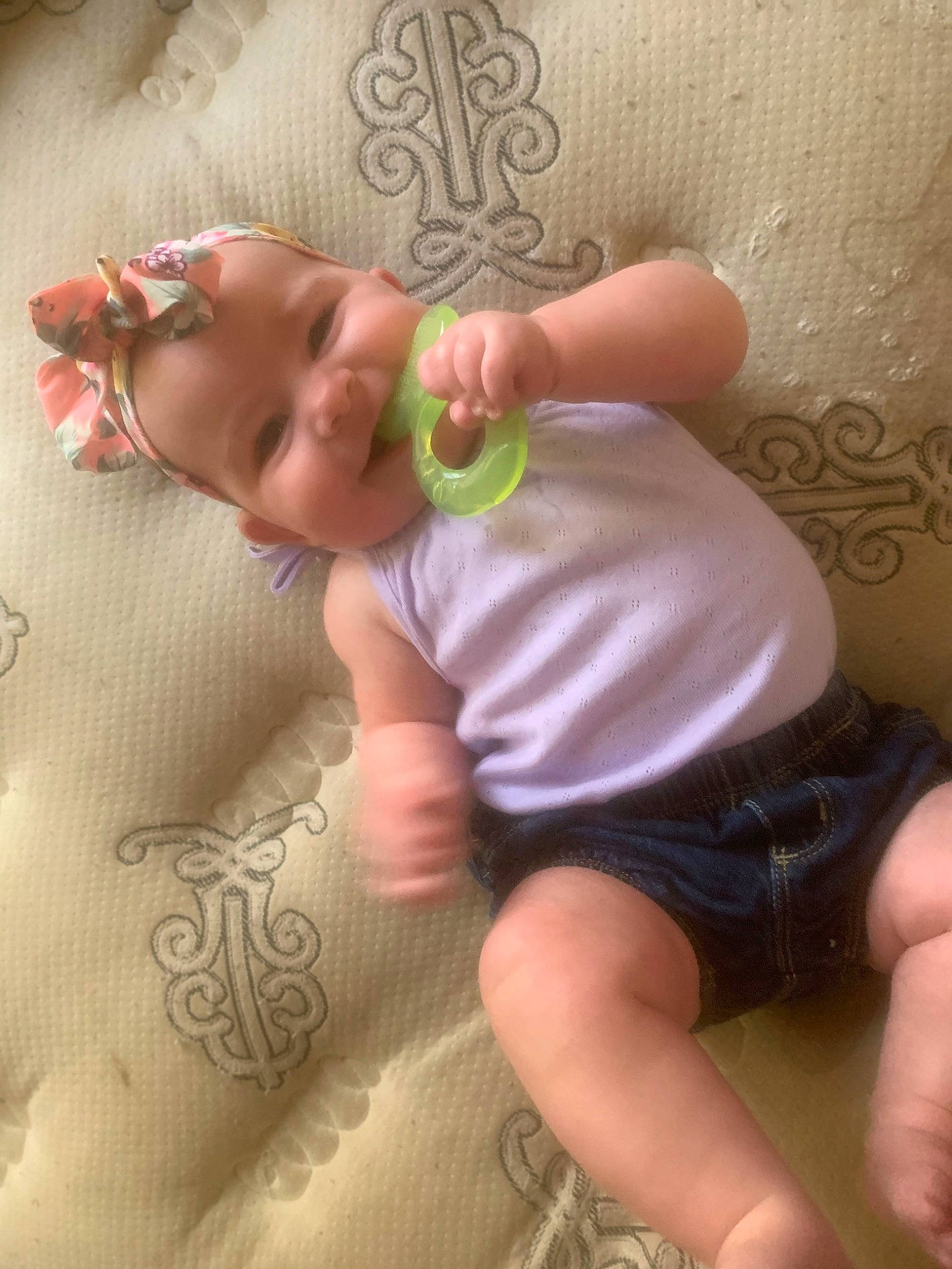 Coleene is registered to the contest to win money with this photo: baby, baby_toddler_clothing, cheek, facial_expression, finger, head, headgear, human_body, joint, joy, knee, leg, mouth, neck, nose, person, pink, skin, sleeve, thigh