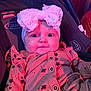 Jazlynn is registered to the contest to win money with this photo: baby, infant, headband, bow, car_seat, clothing, pink, floral, cute, face, child, portrait, sitting, indoors, young_child, apparel, person, headwear, expression, seat