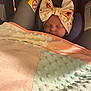 Jazlynn joined the competition — help win amazing prizes! baby, sleeping, blanket, headband, bow, car_seat, infant, soft_texture, pastel_colors, peaceful, child, cute, indoors, cozy, newborn, face, resting, safe, wrapped, comfort
