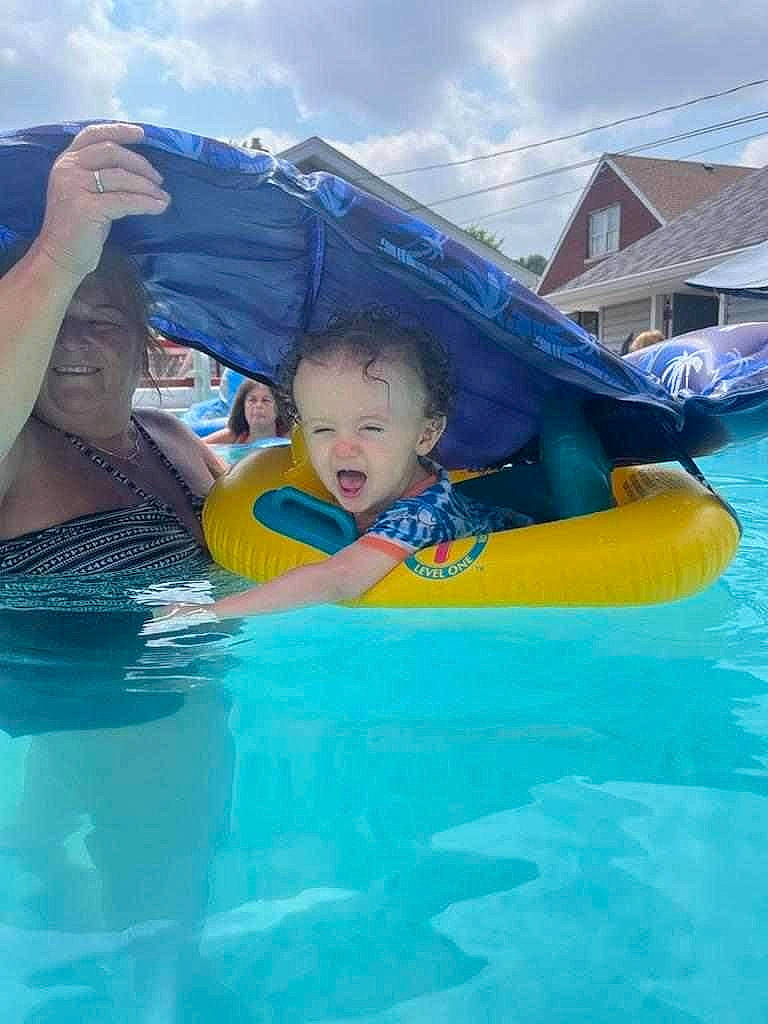 Jacob is registered to the contest to win money with this photo: aqua, baby, baby_float, bathing, blue, child, cloud, fun, happy, inflatable, joy, leisure, leisure_centre, person, personal_protective_equipment, recreation, sky, swimming_pool, swimwear, toddler