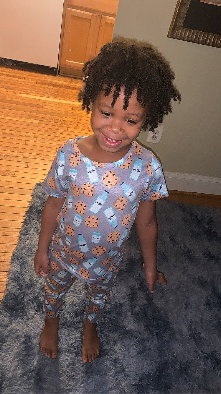 Emir is registered to the contest to win money with this photo: baby_toddler_clothing, barefoot, cheek, child, face, floor, flooring, fun, hair, happy, joy, neck, nose, person, room, skin, sleeve, smile, t_shirt, thigh