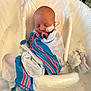 newborn, baby, hospital, blanket, bassinet, medical_tube, wrapped, sleeping, infant, plastic_bassinet, hospital_room, towel, patient, child, face, peaceful, healthcare, care, medical, resting