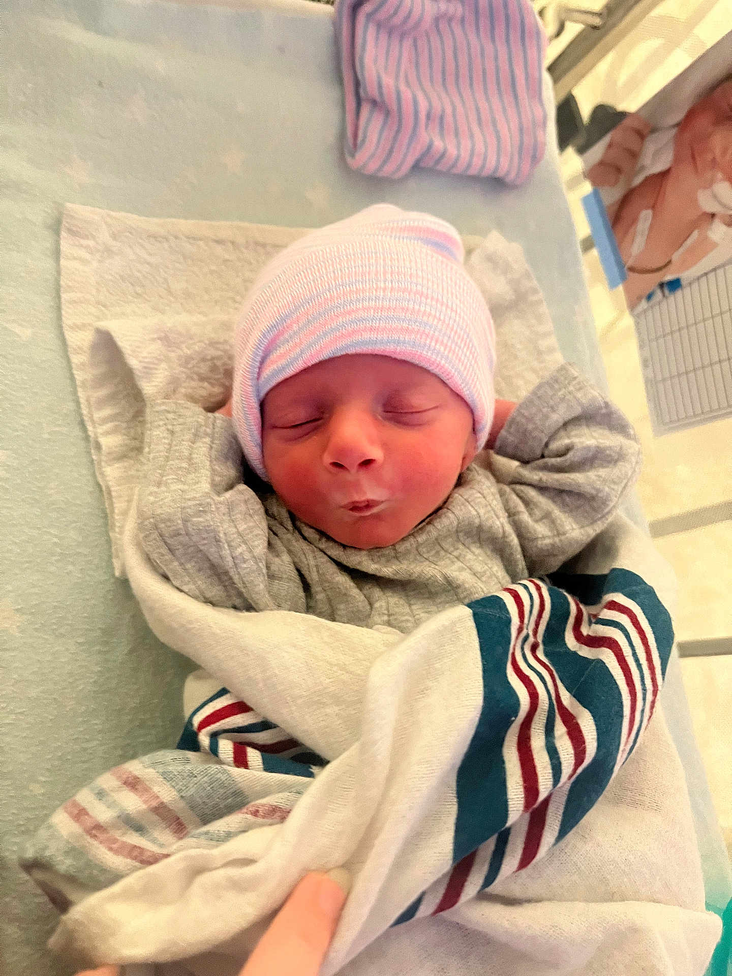 Benny joined the competition — help win amazing prizes! newborn, baby, infant, hospital, blanket, beanie, sleeping, swaddled, cute, child, person, bed, soft, warm, resting, clinic, healthcare, tiny, face, hands